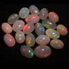 The Most Beautifull Highest Quality ETHIOPIAN Opal - Oval Shape Cabochon - Every Pcs Have Full Amazing Flashy Fire size - 6x9- 8x11 mm - 20 pcs weight 31.00 cts lot